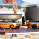 The Jetboil Genesis car camping stove is the most expensive recommendation on our list, but it includes custom-designed cookware that maximizes what you get from its dual burners, and everything nests when not in use to take up less space.